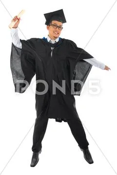 Asian male university student in graduation gown jumping Stock Photos