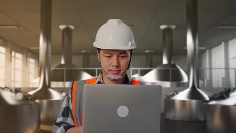 Asian Male Use Computer While Walking at Beer Plant Stock Footage 332159134