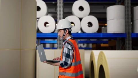 Asian Male Use Computer While Walking at Polymer Plant Stock Footage 333776018