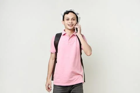 Asian man backpacker making a phone call. digital nomad and travelling conc.. Stock Photos