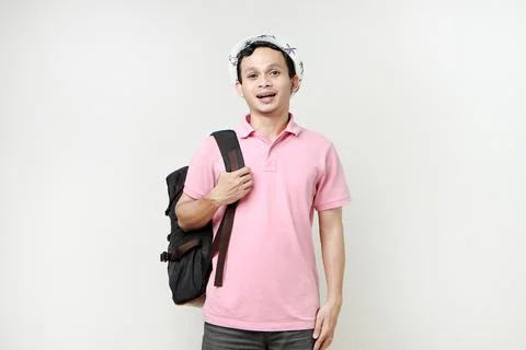 Asian man backpacker portrait. digital nomad and travelling concept. on iso.. Stock Photos