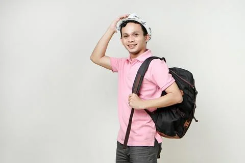 Asian man backpacker portrait. digital nomad and travelling concept. on iso.. Stock Photos