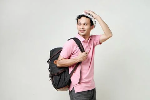 Asian man backpacker portrait. digital nomad and travelling concept. on iso.. Stock Photos