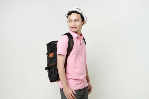 Asian man backpacker portrait. digital nomad and travelling concept. on iso.. Stock Photos