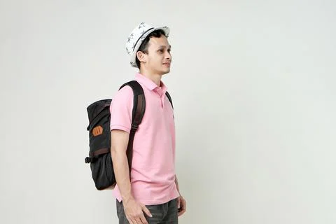 Asian man backpacker portrait. digital nomad and travelling concept. on iso.. Stock Photos