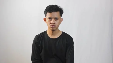 Asian man burping Video stock 319411722