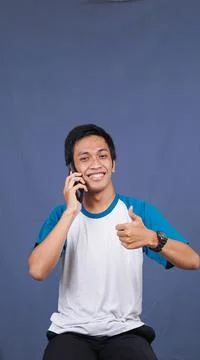 Asian man calling and expression Stock Photos