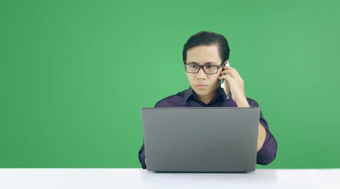 Asian Man Calling and Typing  - Green Screen 4K Resolution Stock Footage 60610997