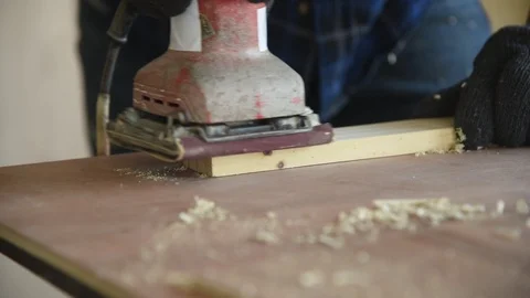 Asian man carpenter worker use grinder machine to grind wood Stock Footage 124883412