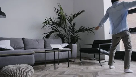 Asian Man Dancing At Home With Wireless Headphones Stock Footage 114823313