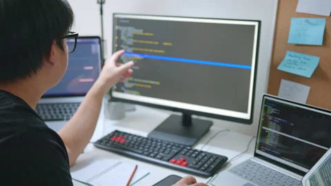 Asian man, developer programmer, software engineer using computer Stock Footage 196908481