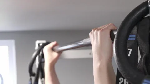 Asian man doing a pull up close up Portland OR USA June 20 2025 Stock-Footage 311678726