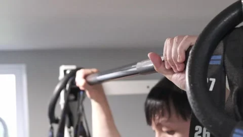 Asian man doing a pull up close up Portland OR USA June 20 2025 Stock-Footage 311678731