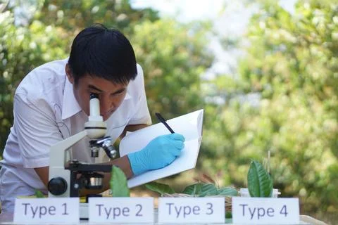 Asian man is doing science experiment Stock Photos
