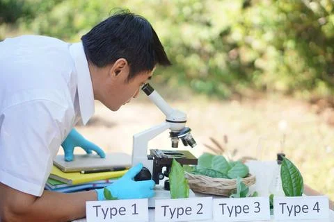 Asian man is doing science experiment Stock Photos
