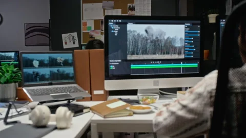 Asian Man Editing Cgi Explosion Visual Effects on Computer Stock Footage 348348751