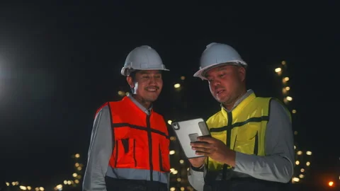 Asian man engineer working with tablet at petroleum oil refinery. Stock Footage 270460521