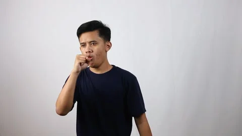Asian man experiencing cough Stock Footage 314935671