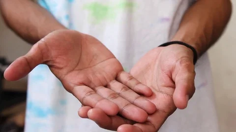 An Asian Man Extends His Hands Stock Footage 120553463