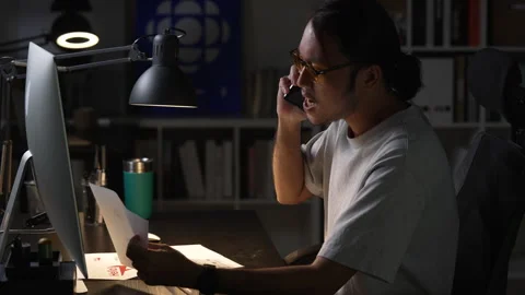 Asian man graphic designer working on computer drawing sketches logo design. Vidéo 248527986