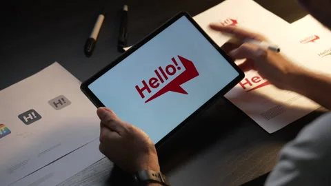 Asian man graphic designer working on computer drawing sketches logo design. Видео 248530824