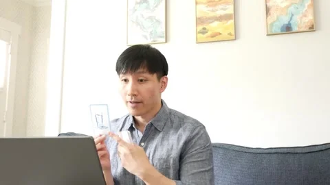 Asian man having an online class with students Видео 247480042