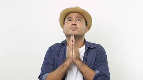 Asian man looking up and praying heartily to god, pleading forgiveness with humb Stock-Footage 144652265