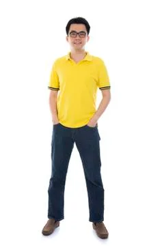 Asian man looking at camera against different backgrounds Stock Photos
