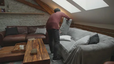 Asian man making a couch at home. Stock Footage 153497574