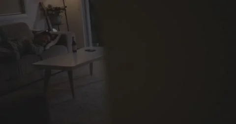 Asian Man passed out on couch reveal Stock Footage 196849502