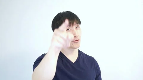 Asian man pointing to the camera saying you multiple times Stock Footage 248868938