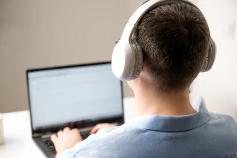 Asian man programming or online shopping using laptop.Selective focus Stock-Fotos