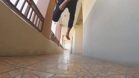Asian man run and jumping jump over Stock Footage 124453401
