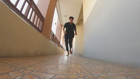 Asian man run and jumping jump over Stock-Footage 124453403