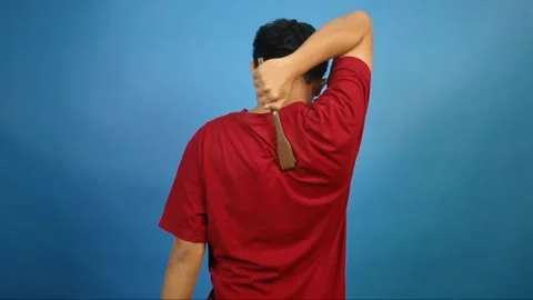 Asian man scratching itchy back Stock Footage 327096370