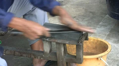 Asian Man Sharpening A Knife - Close Up 스톡 동영상 12324876