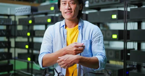 Asian man smiling at camera Stock Footage 197101456