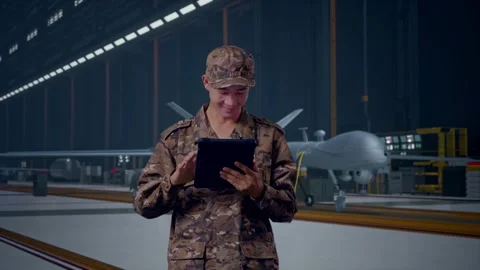 Asian Man Soldier Using A Tablet , Military Drone Stock Footage 314937715