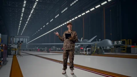Asian Man Soldier Using A Tablet And Pointing To Side , Military Drone Stock Footage 314938355