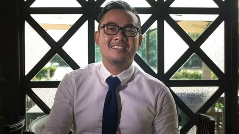 Asian Man Talking Stock Footage 111011343