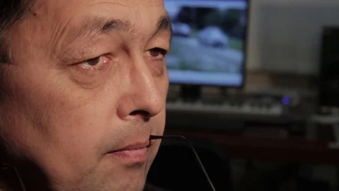 Asian man thinking matters and getting down to work Stock Footage 69211366