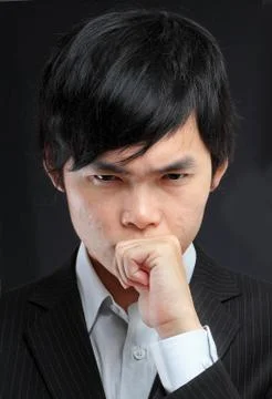 Asian man thinking Stock Photos
