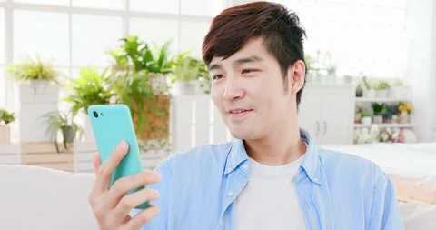 Asian man use smartphone Stock Footage 106536878
