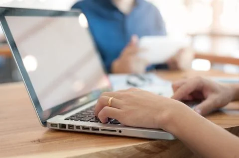 Asian man using laptop computer in cafe, Stock Photos