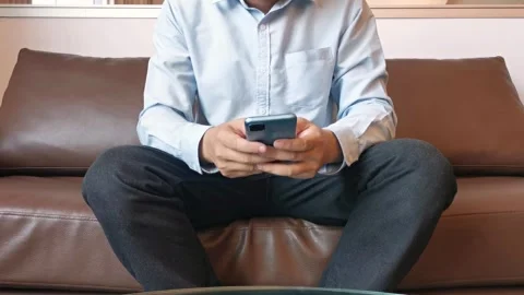 Asian Man Using Smartphone Gadget Social Media Mobile Application Stock Footage 296640479