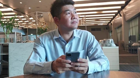 Asian Man Using Smartphone Gadget Social Media Mobile Application Stock Footage 296640520