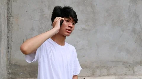 Asian man is using smartphone 写真素材