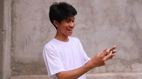 Asian man is using smartphone 写真素材