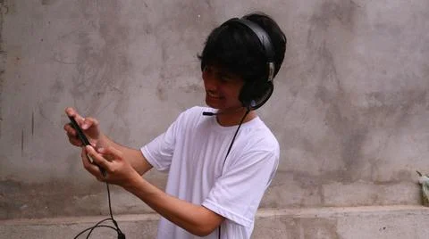 Asian man is using smartphone 写真素材