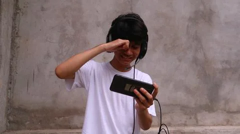 Asian man is using smartphone 写真素材